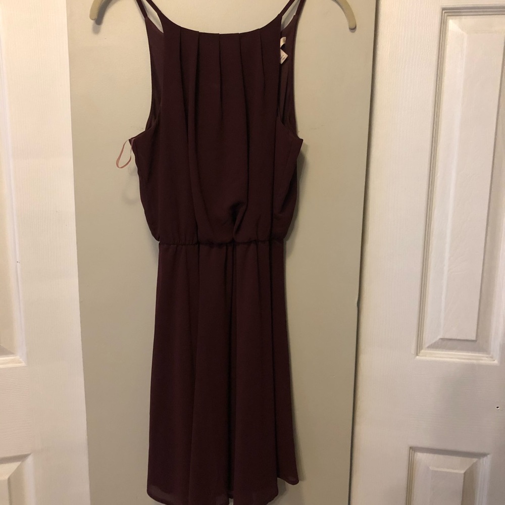 Francesca’s deep purple dress